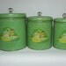 Vintage green metal cannister set decals