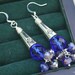 Cobalt blue and lilac crystal silver chandelier earrings.