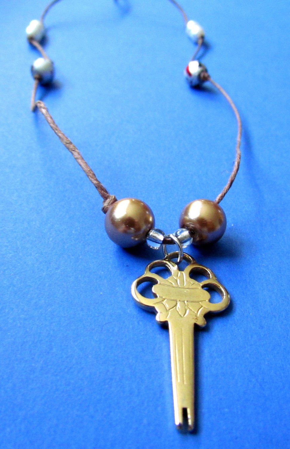 Brown Hemp Necklace with Colorful Beads and Gold Key