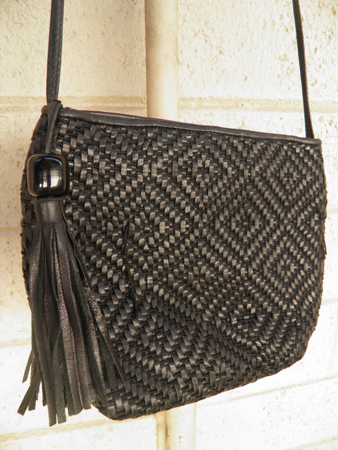 1980s Woven Black Leather Shoulder Bag Purse with Tassel By Sharif Made in USA
