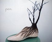 Branches and roots in wooden shoe last-recycled materials