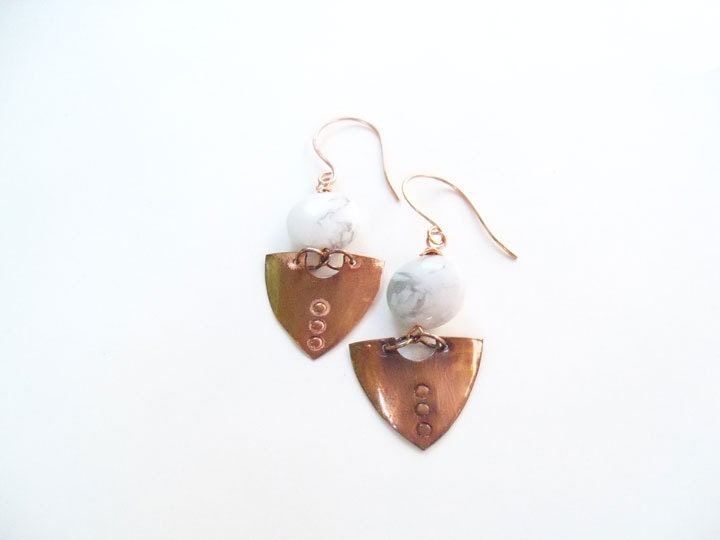 30% off... Regular 12.00 on sale for 8.40.. Copper shield drop earrings with white marbled bead
