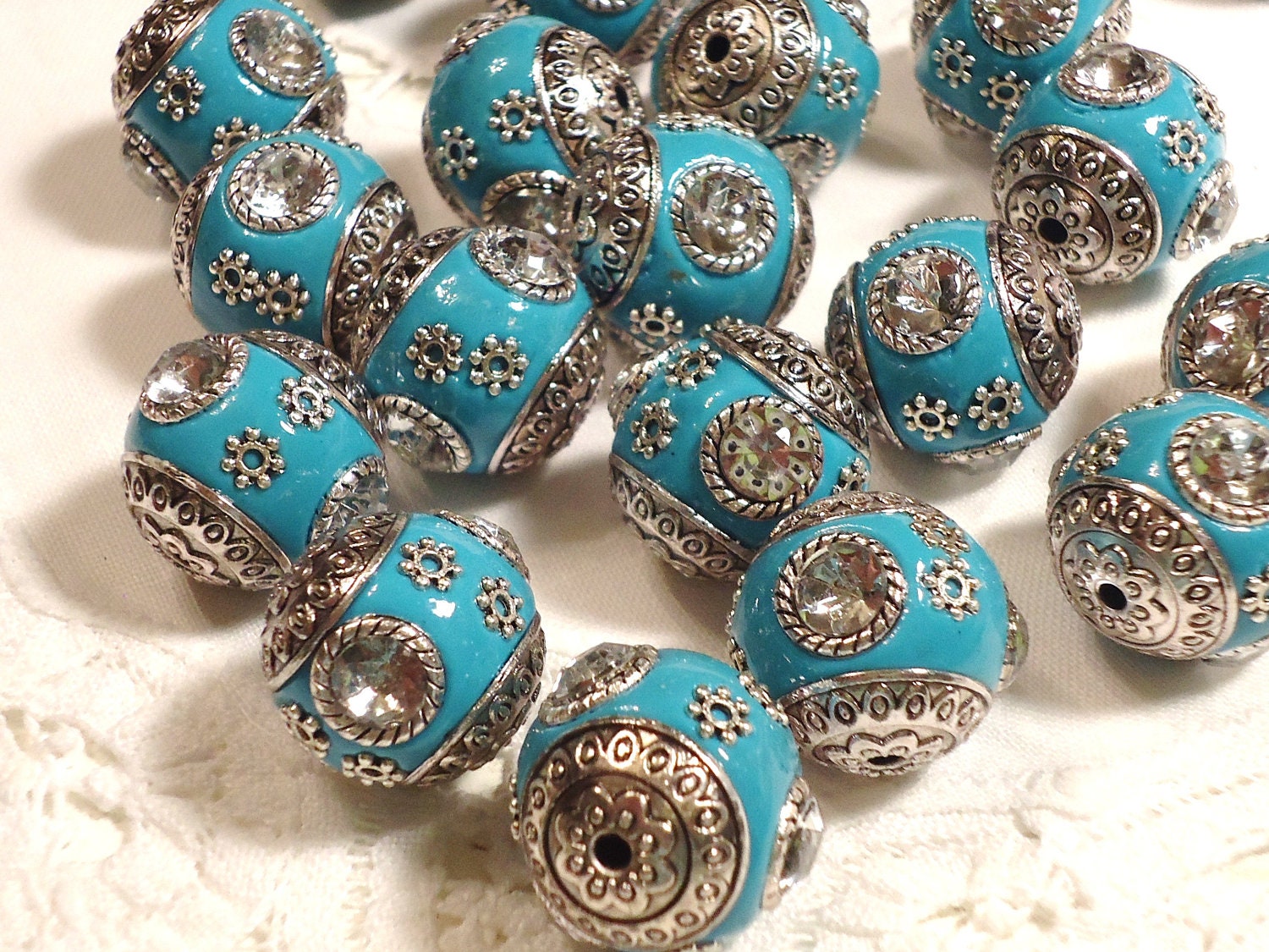 14 Turquoise Heavily Embellished Beads
