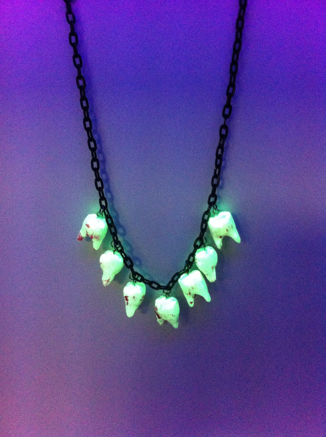 Glow in the dark bloody teeth necklace - zombie, rave, cybergoth