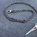 Bird skull necklace on gunmetal chain