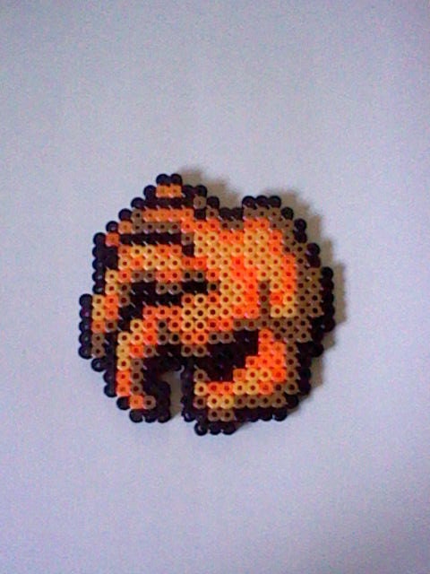 The Legend of Zelda Wall Master perler bead creation....melted beads with magnet on back