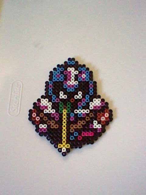 The Legend of Zelda Archer perler bead creation....melted beads with magnet on back