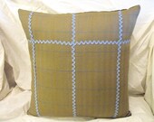Upcycled vintage fabric cushion/pillow  with ric rac trim.
