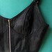 Black sexy vintage (80s) lace-up/zipper leather bralet, in great condition