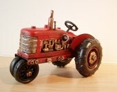 Red tractor collectible  miniature, retro metal reproduction, rolling wheels