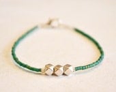 petite emerald green and antique silver beaded bracelet