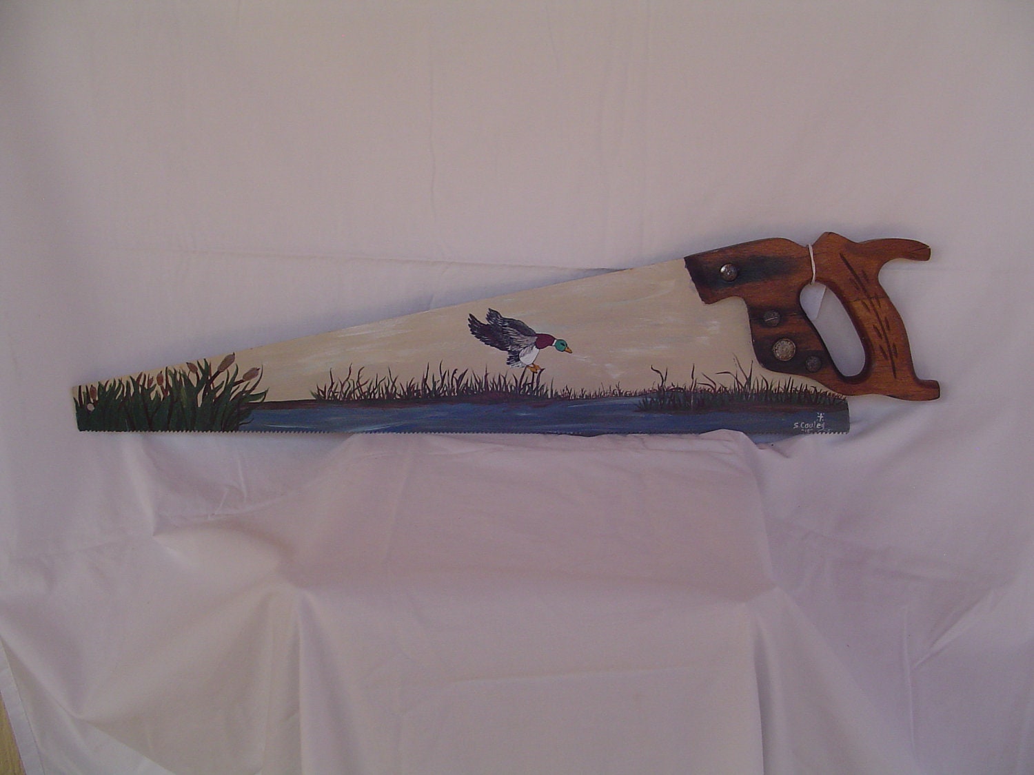Items similar to Painted hand saw on Etsy