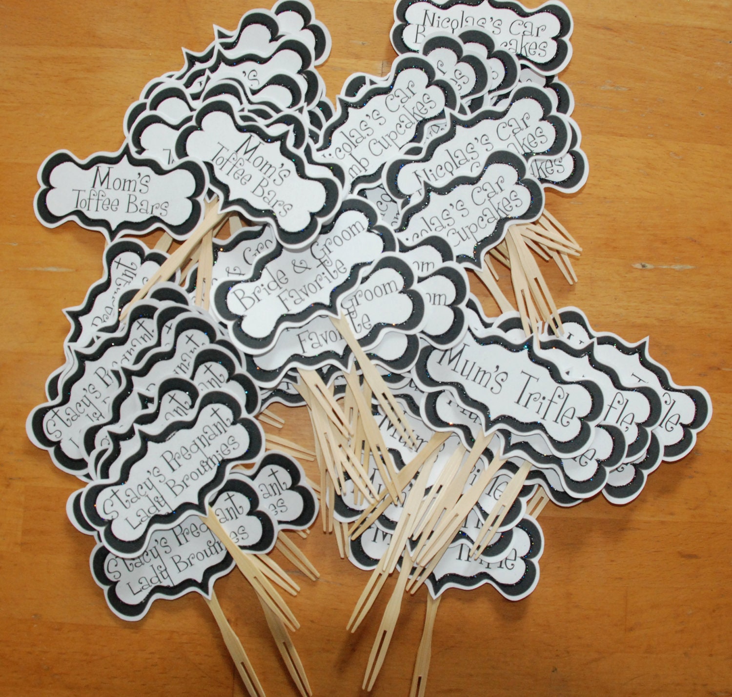 Glittered logo cupcake toppers.