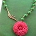 Le Jardin- resin flower and gold bird  necklace