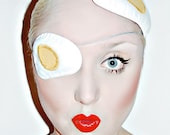 White & yellow fried egg Eye patch