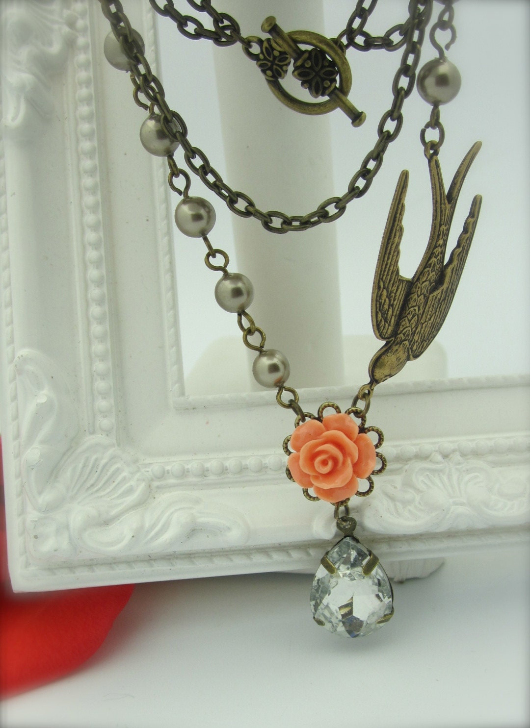 FIND YOUR PASSION - Crystal Jewel Accented With a  Coral Rose Cabochon And Features A Antiqued Sparrow