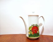 vintage Teapot, Groovy Mushrooms in Orange, Yellow and Green. White teapot.