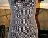 Formfitting 80s dress black with white dots
