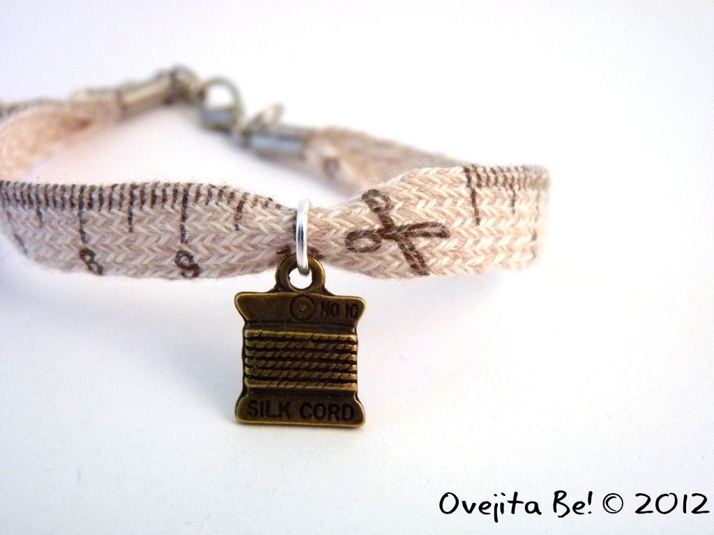 Seamstress bracelet, cotton ribbon