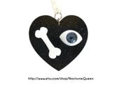 Black Glitter Acrylic Heart Eye and Bone Pendant Necklace