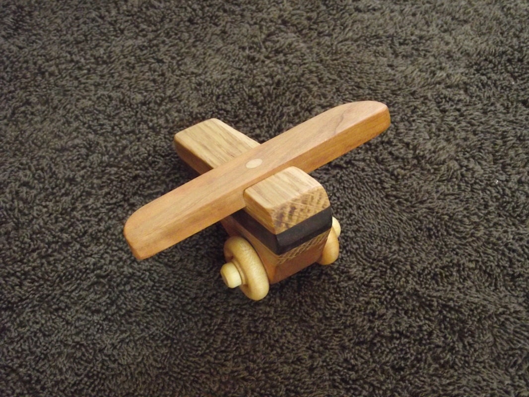 MINI TOY PLANE, handcrafted with regional, natural, non-toxic oil finish.