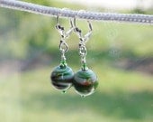 Painted green glass bead sterling silver earrings