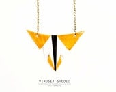 Bib necklace orange & black inspired by Africa.  Tribal jewelry handmade by Viruset Studio Ceramic Jewelry