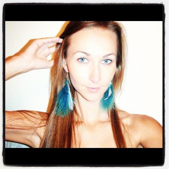 Blue and white feather earrings with silver / bead detail