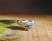 Belle's Chipped Cup