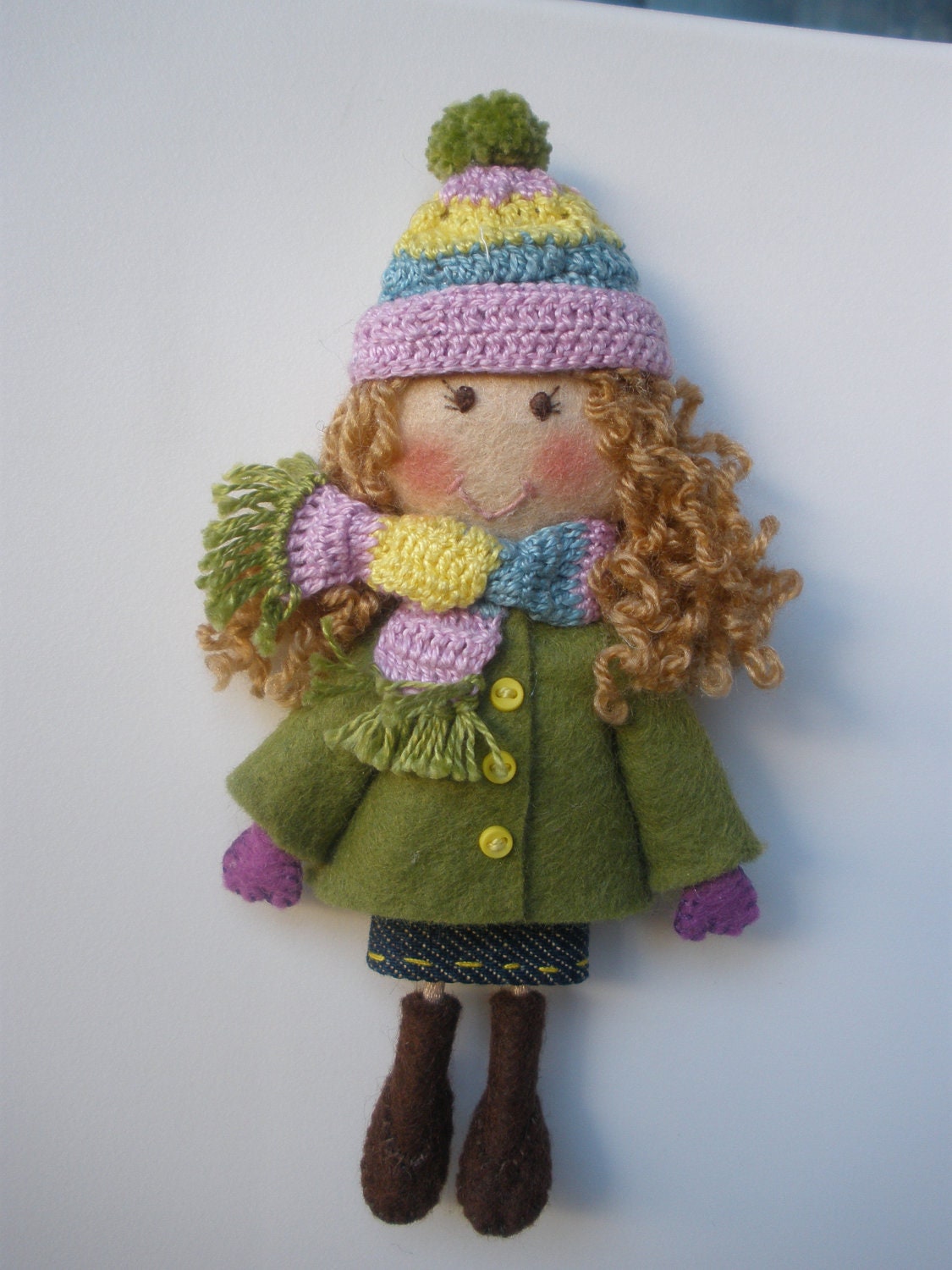 Felt doll brooch with crochet scarf and hat