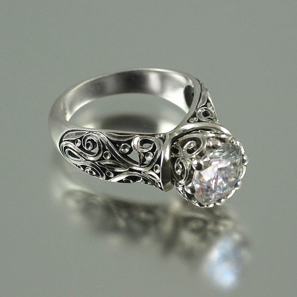 The ENCHANTED PRINCESS Forewer Brilliant Moissanite 14K gold engagement ring