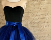 Black sweetheart neckline with sheer shoulder leotard. Ready to ship in small, medium and large.