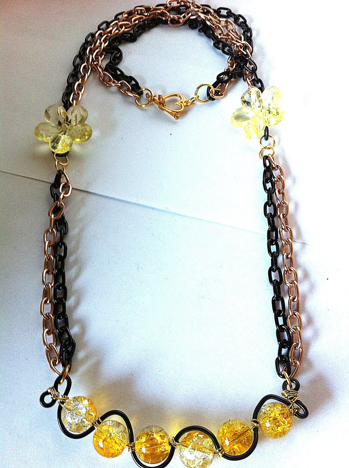 Yellow,clear, and black crackle glass squiggle necklace fade,ombre