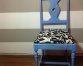 Distressed Sky Blue Chair with a Black and White Leaf Fabric