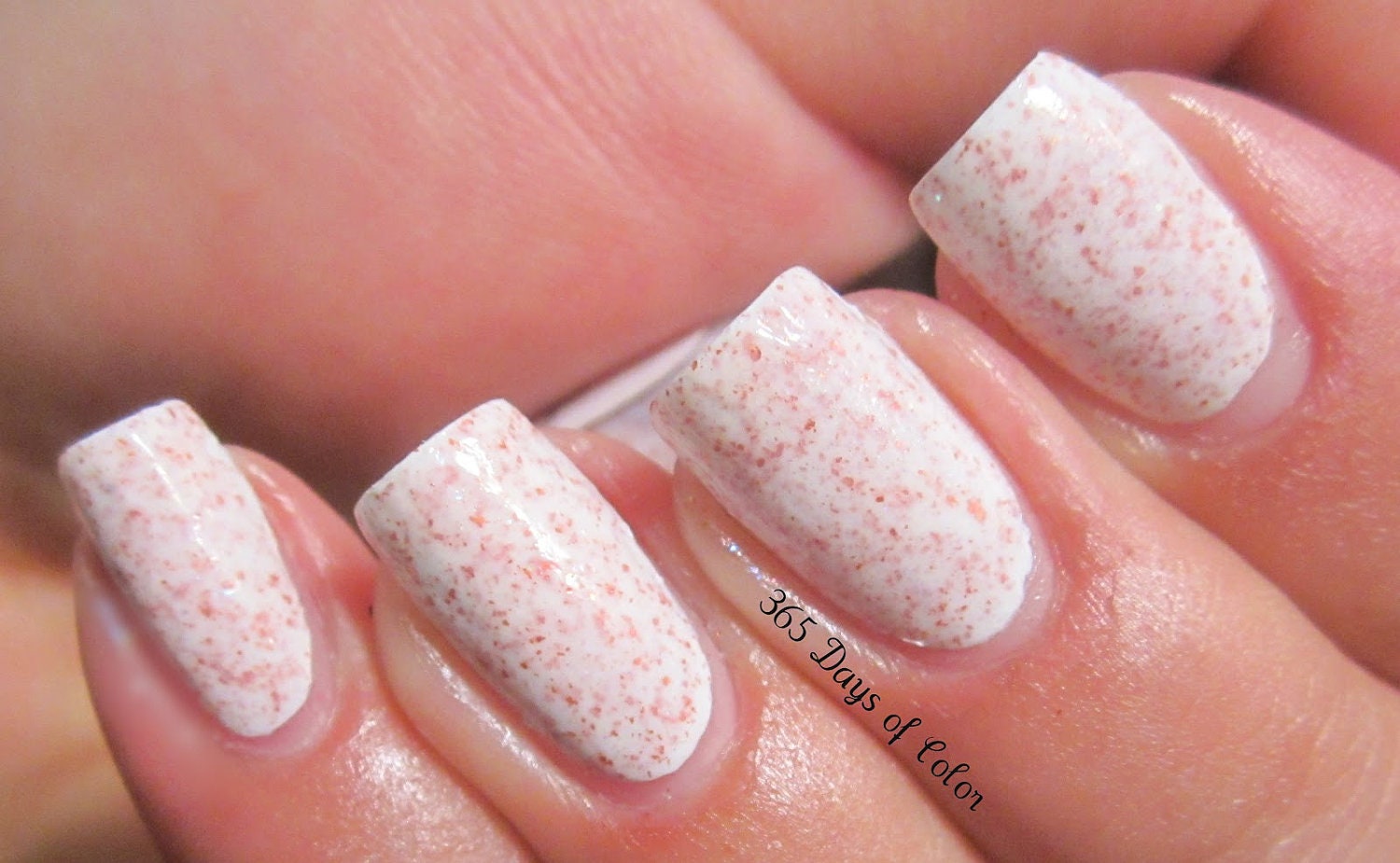The Savage North Nail Polish - MINI - white jelly with red flecks and blue shimmer