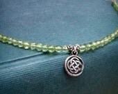 Petite Fine Silver Celtic Knot Pendant Necklace with Peridot on Sterling Silver Chain