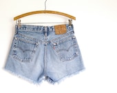 vintage 80s Levis 501s Cut Offs / Cut Off Denim Shorts / button fly frayed jean shorts / destroyed / faded / boho hippie 30 waist
