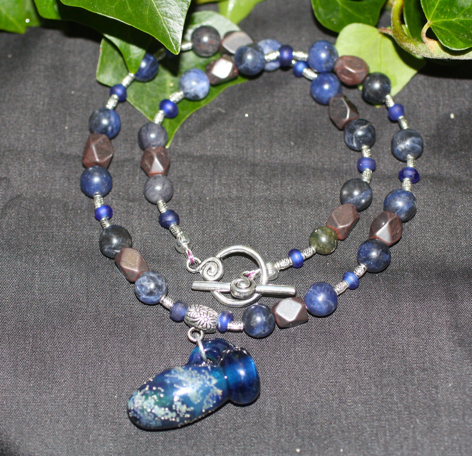 Vessel of the Stars - Glass Bottle Necklace with Hematite