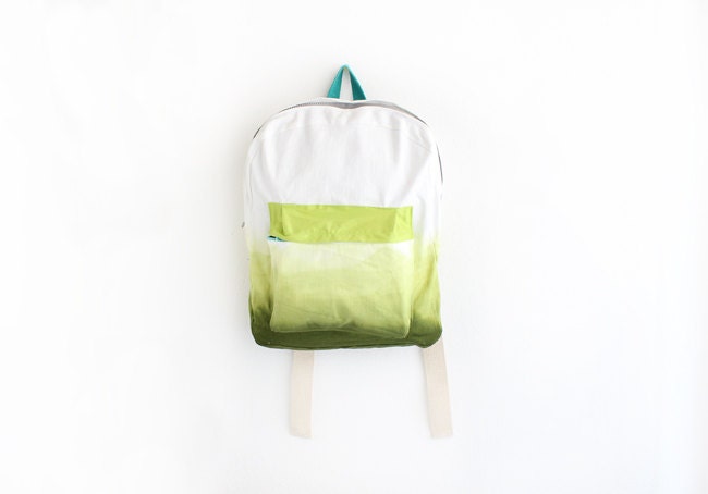 olive green backpack with lime green pouch