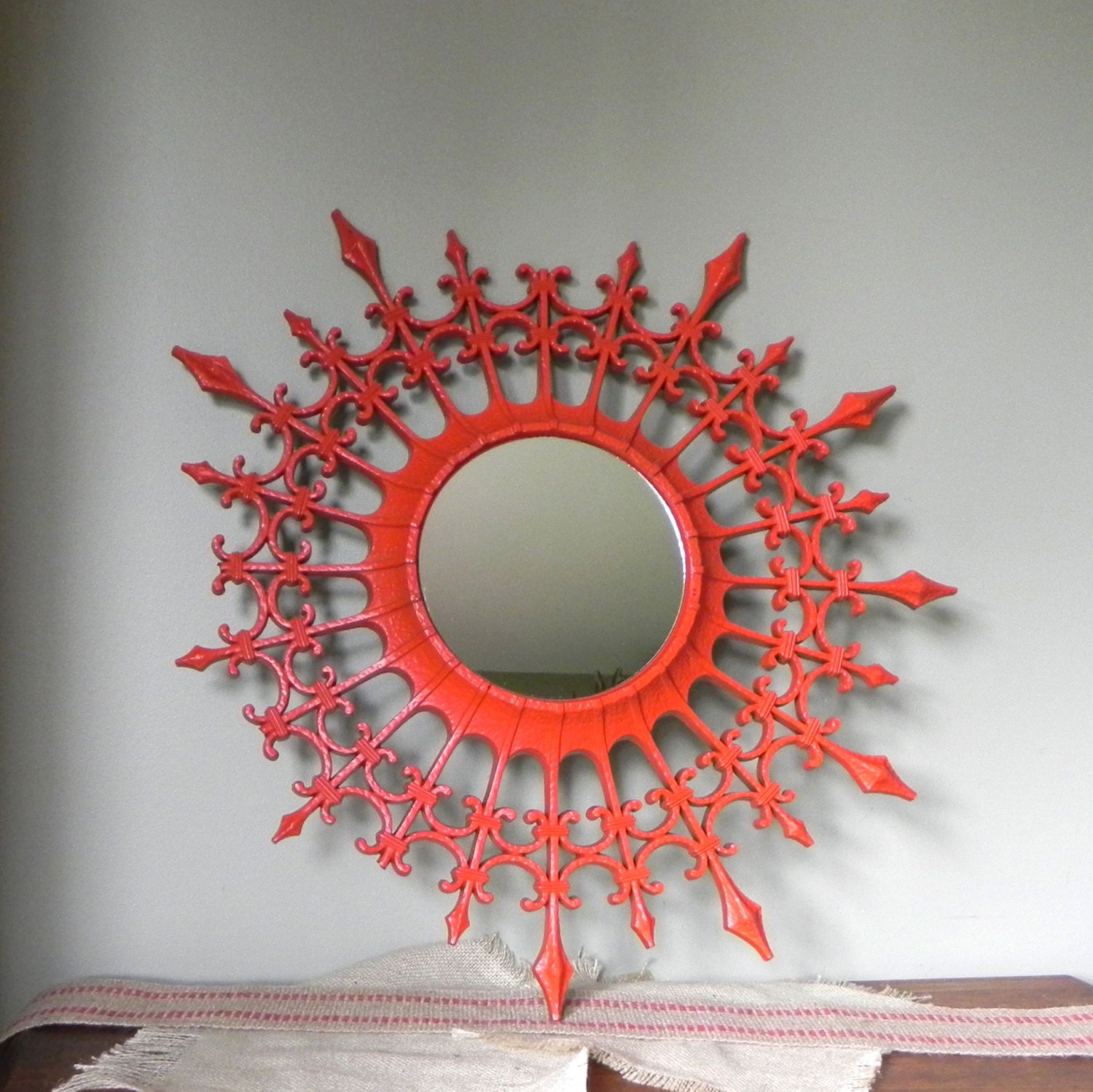 Retro orange sunburst mirror - asymmetrical bright color - mid century modern fun