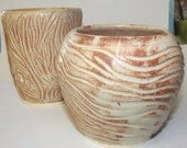 Set of two orange & white vases hand carved