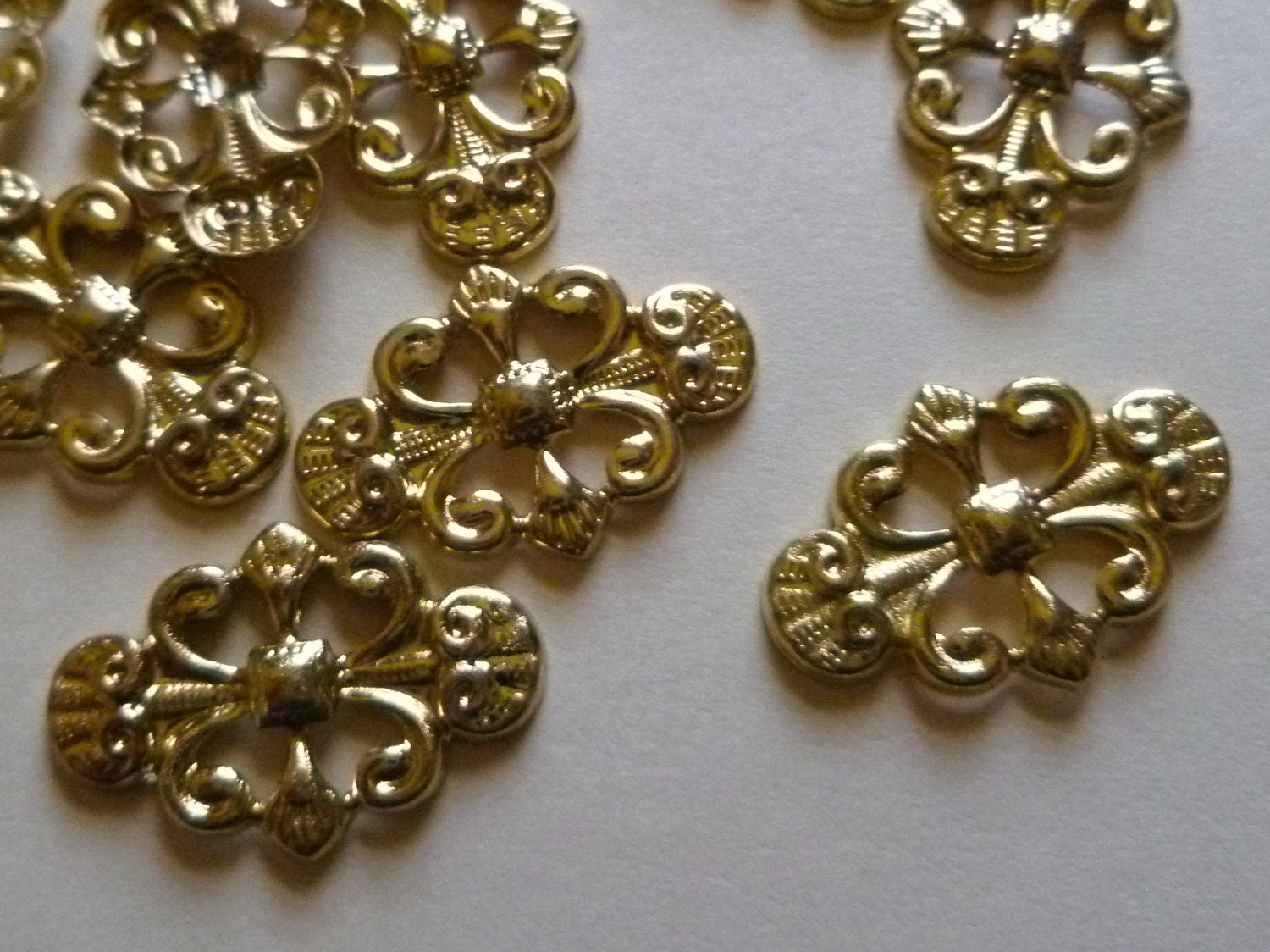 Filigree Components 17mm oblong floral disc- pkg of 25