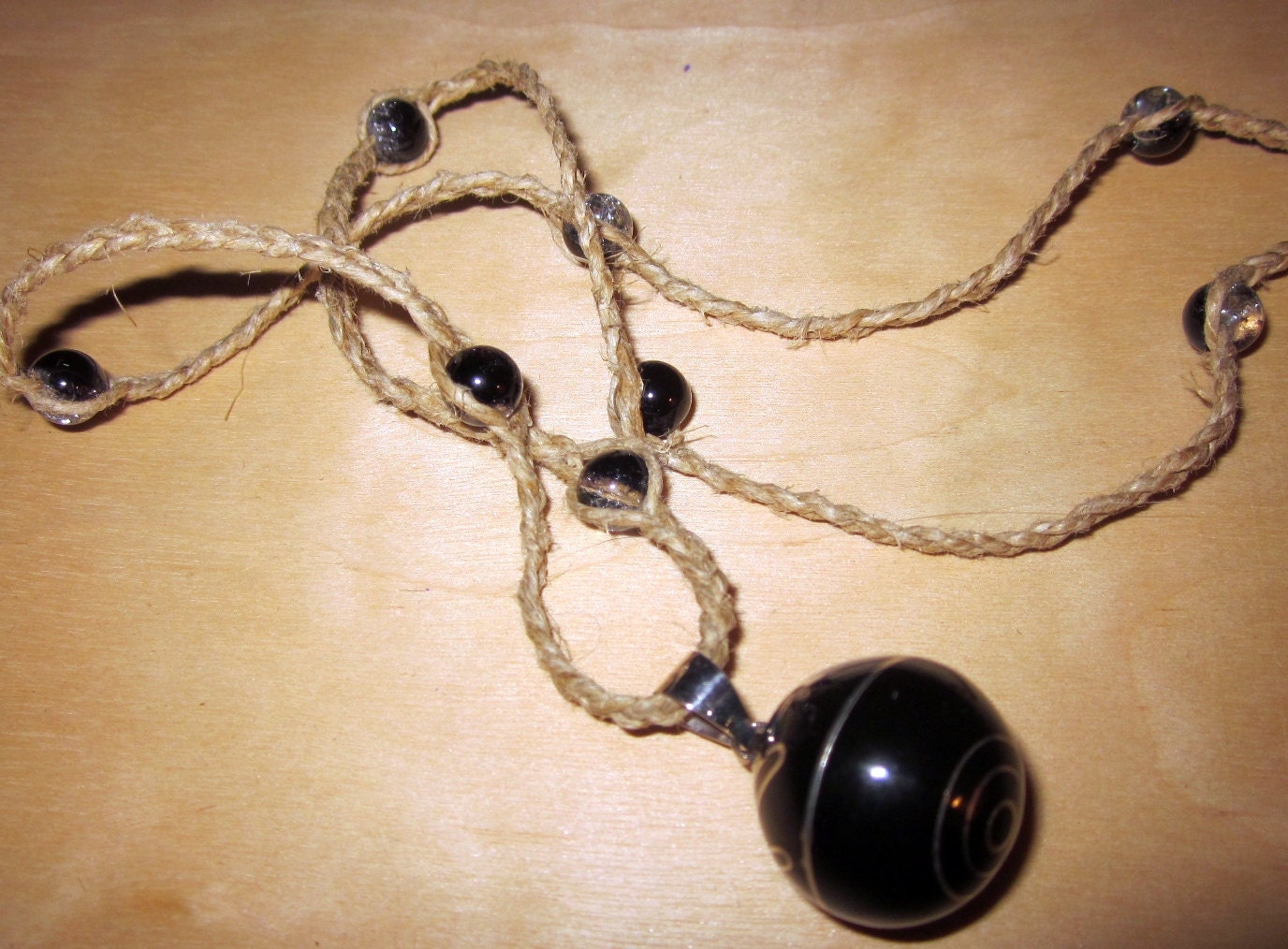 Black Harmony Ball on Braided Hemp Cord