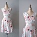 1950s dress / 50s day dress / wrap dress / Black-eyed Susan