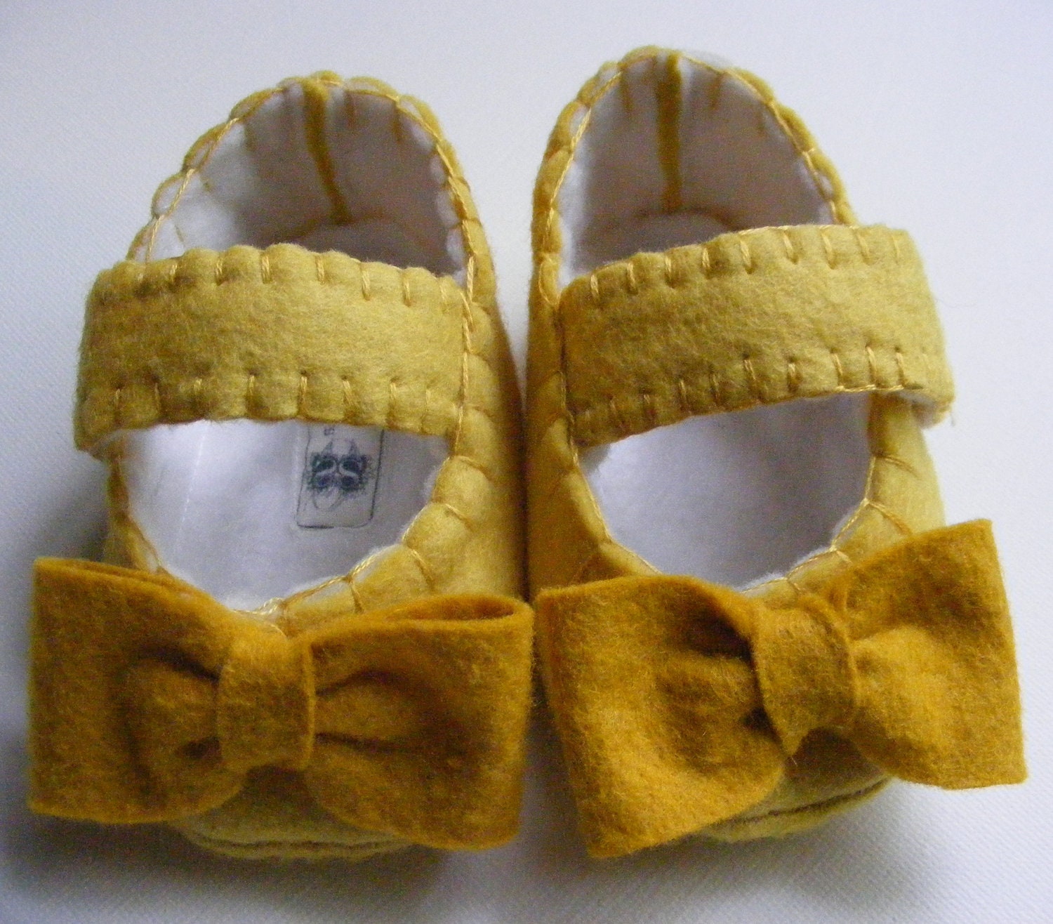 Sunny Yellow Felt Baby Shoes with Mustard Bows