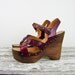 vintage 1970s platforms / Etienne Aigner platforms / 70s studded wood platforms
