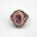 Art Deco Egyptian Revival Ring with Pink Cleopatra Glass Stone