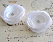 White satin hair flower with rhinestone middle