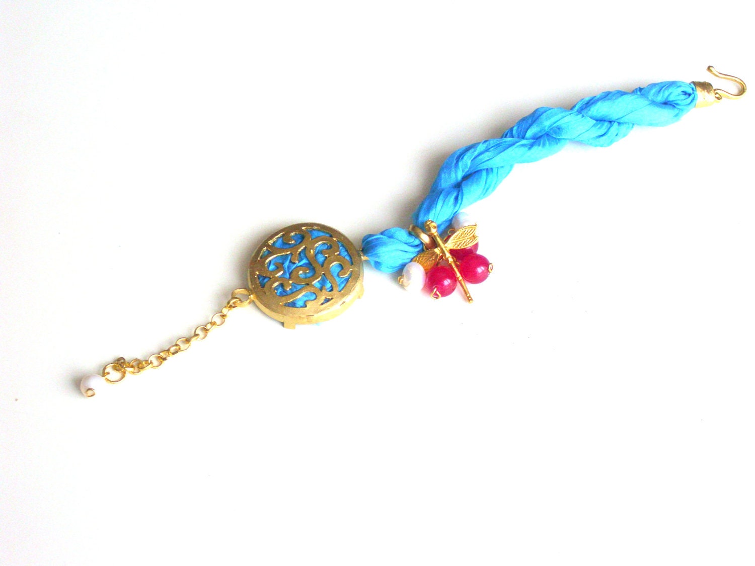 Turquoise silk bracelet with pink jade ,pearl and gold plated metal