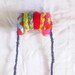 Valentine's Day, Colored circles necklace. Drops on the neck.